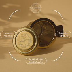 Gold tea strainer with its engraved lid