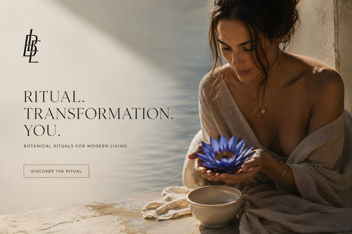 Woman holding a blue lotus flower above a ceramic bowl, by the water